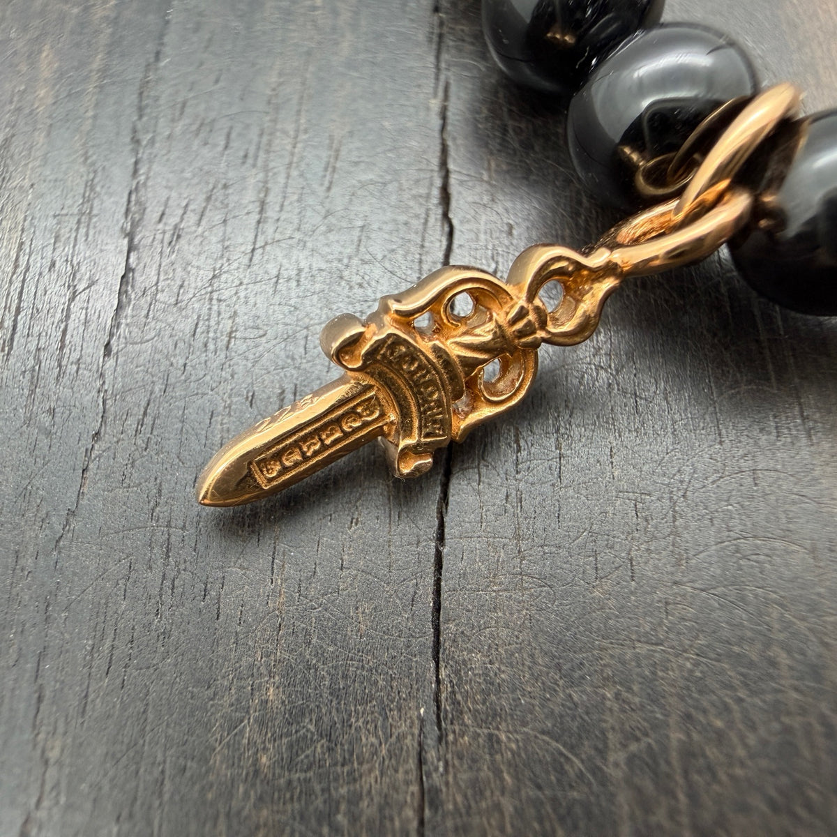 22K Gold Obsidian Beaded Bracelet with Dagger Charm
